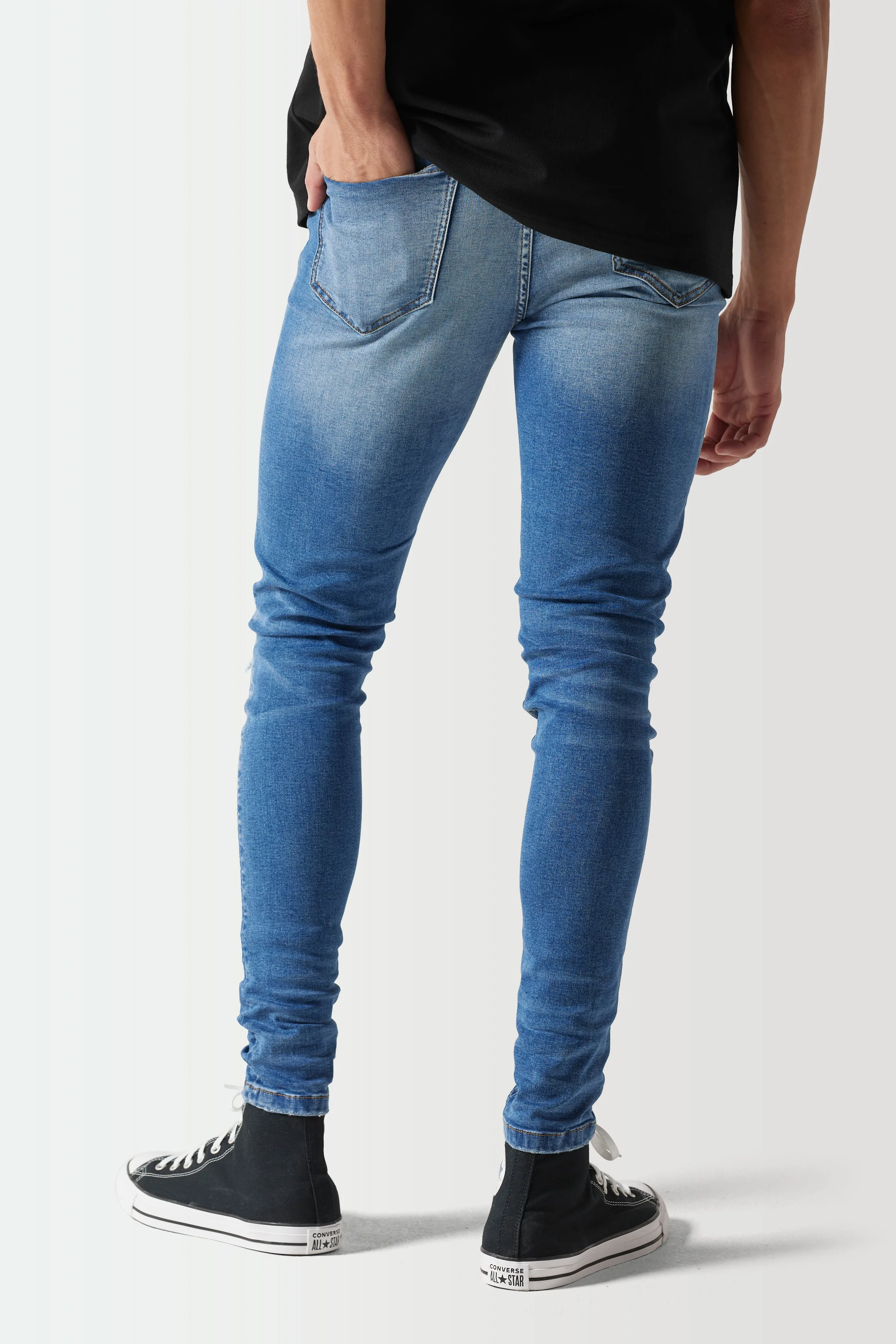 Skinny Sustainable Distressed Jeans - Mid Wash